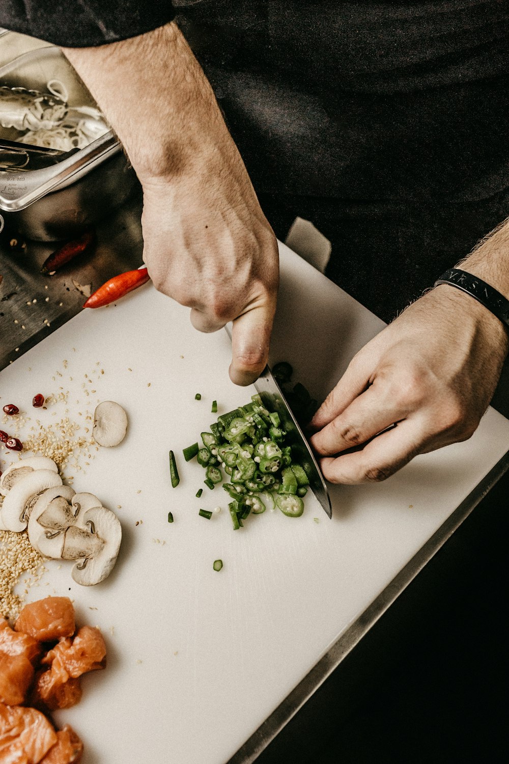 Chef plating a dish in the kitchen